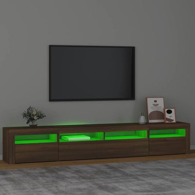 tv-skab med LED-lys 240x35x40 cm brun egetræ