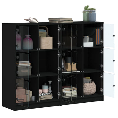 bogreol med låger 136x37x109 cm konstrueret træ sort
